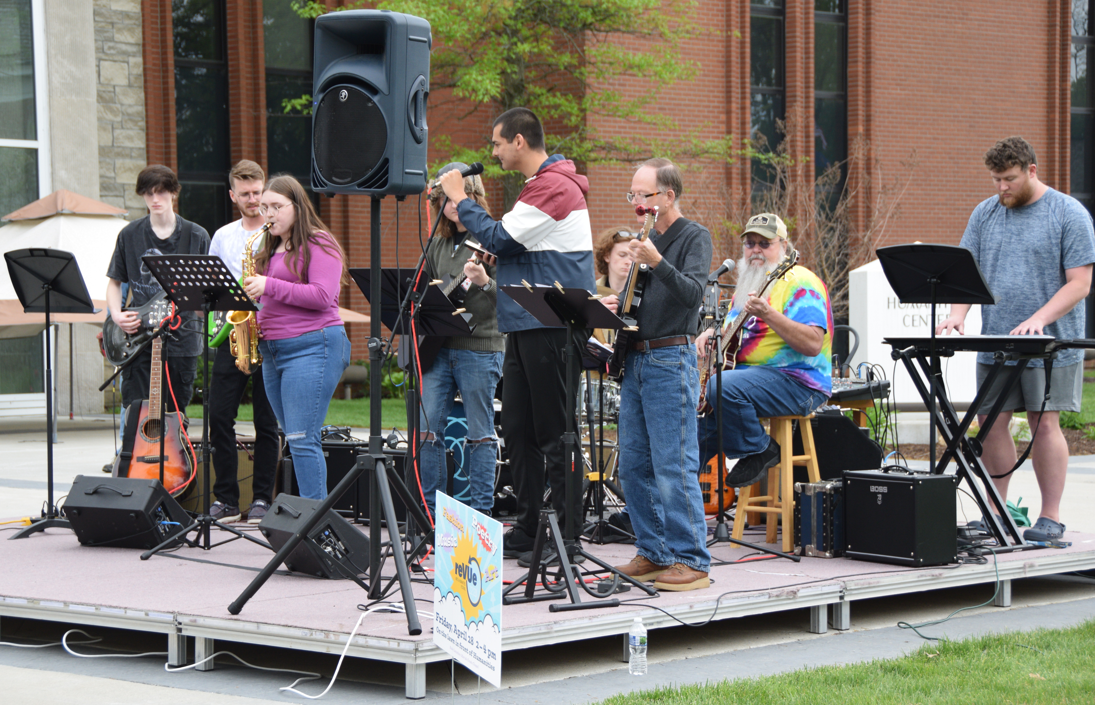 VU Blues Ensemble performs on stage at reVUe: Arts and Humanities Festival at entrance to Shircliff Humanities Center
